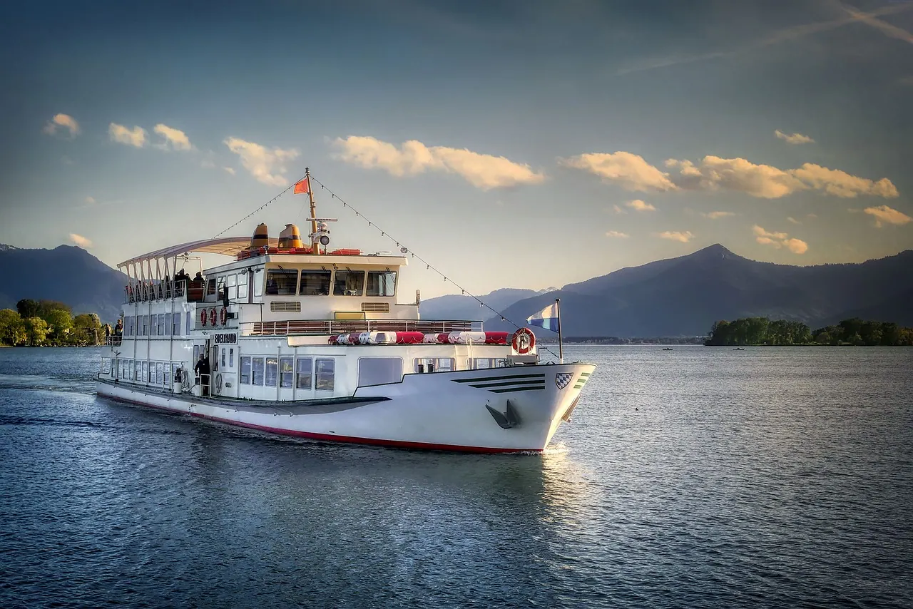 ship, lake, travel, water, ferry, boat, passenger ship, transport, transportation, tour, nature, mood, sunset, evening light, dusk, twilight, chiemsee, chiemgau, bavaria, germany. Ferry trip mistakes compared: how operators handle bad weather